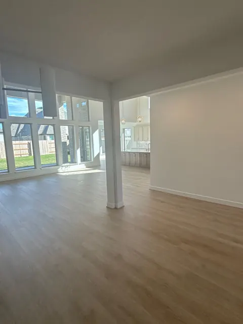 Wood-look flooring across an open-plan living space